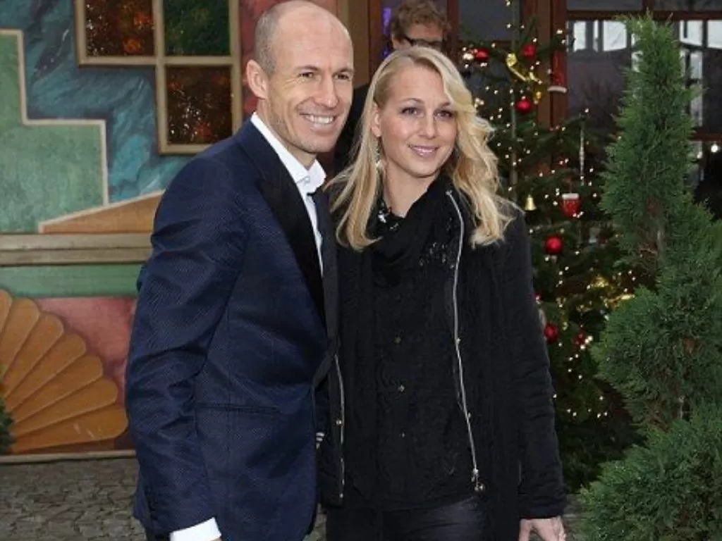 Arjen Robben dan istri. (Pinterest)