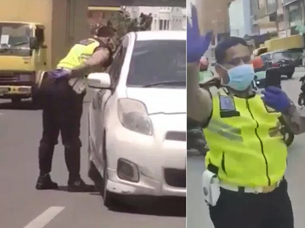 Oknum polisi Bripka Muhammad Rasoki Siregar tertangkap video ludahi pengemudi. (Facebook/Ling)