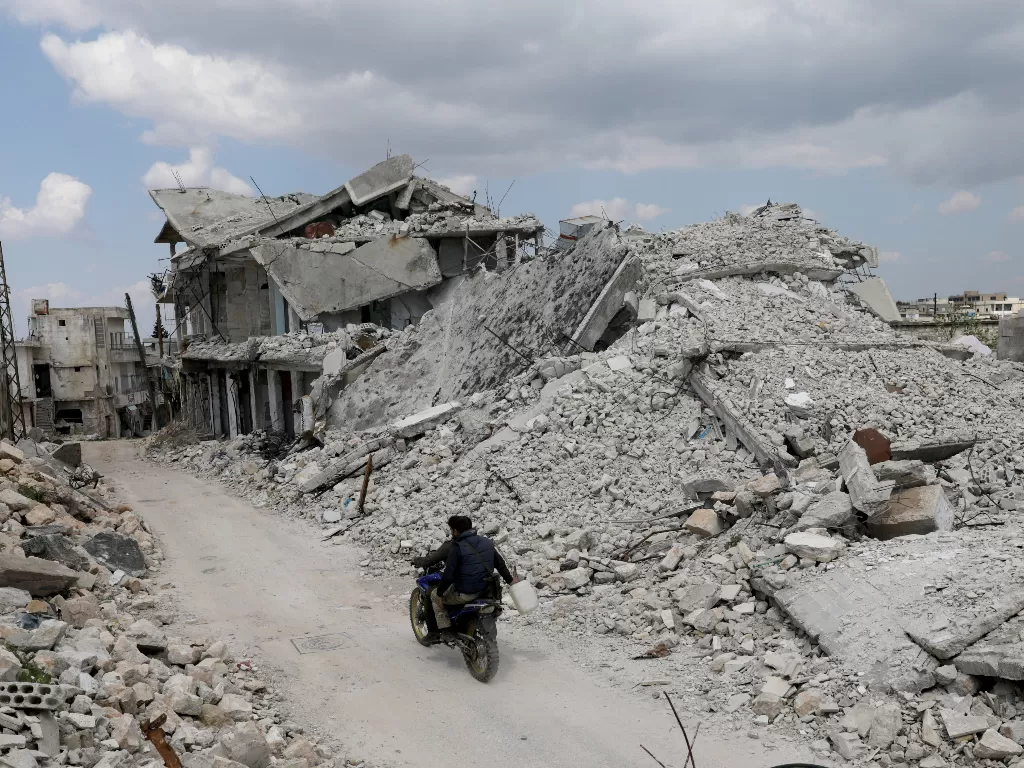 Kondisi di salah satu wilayah di Suriah akibat konflik (REUTERS/KHALIL ASHAWI)