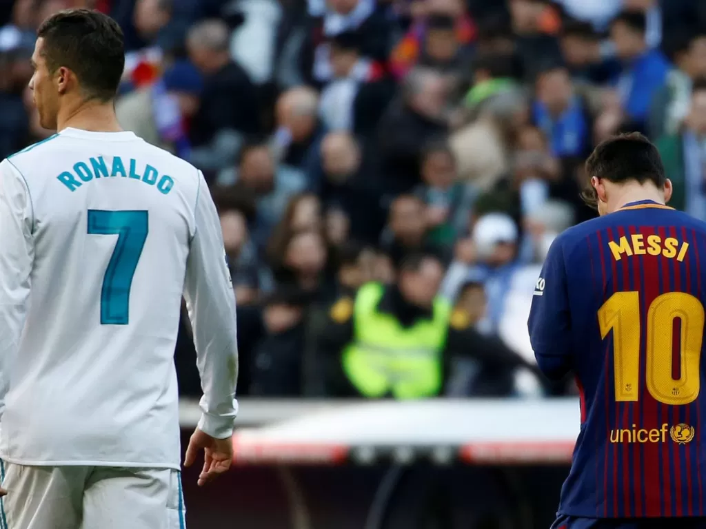Cristiano Ronaldo dan Lionel Messi dalam laga El Clasico antara Real Madrid vs Barceloma. (REUTERS)