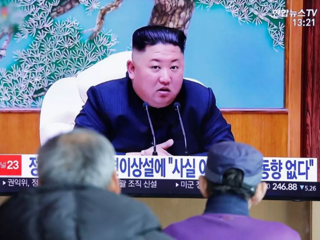 Pemimpin Korea Utara Kim Jong Un saat muncul di sebuah acara di televisi.(REUTERS/Heo Ran)