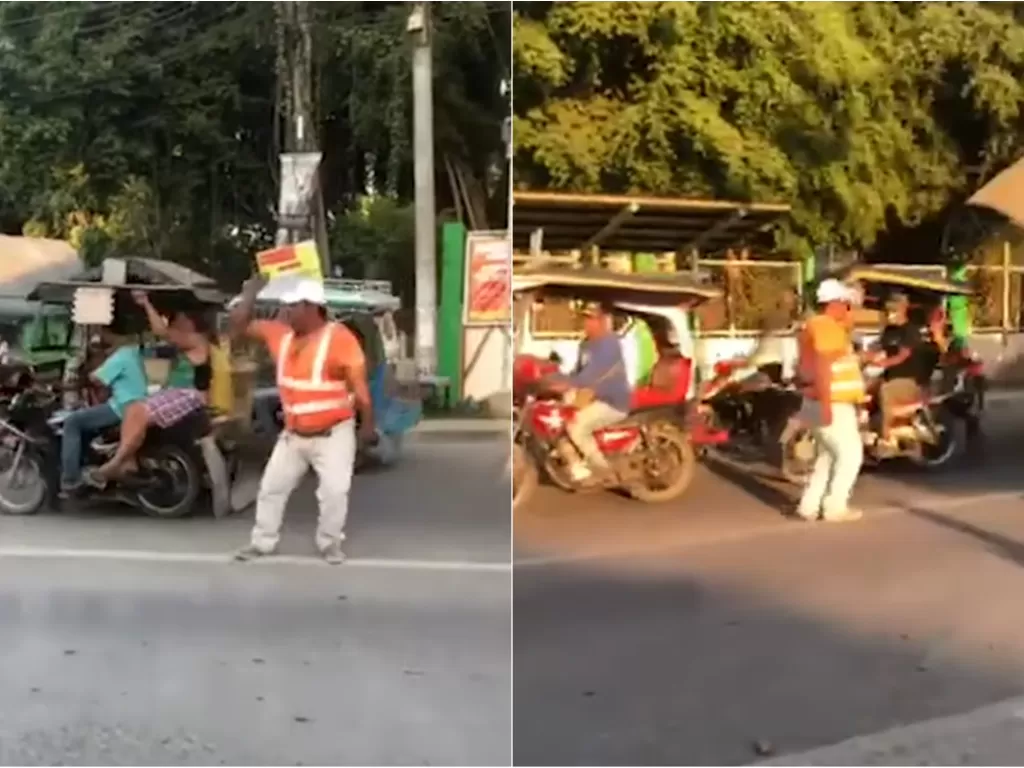 Petugas lalu lintas yang joget di tengah kemacetan untuk hibur para pengendara. (YouTube/Viral Press)