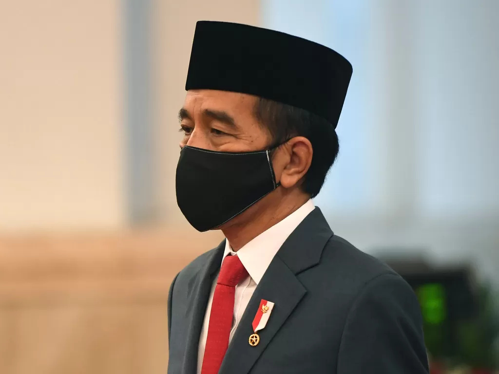 Presiden Joko Widodo mengenakan masker. (Photo/ANTARA FOTO/Akbar Nugroho Gumay)