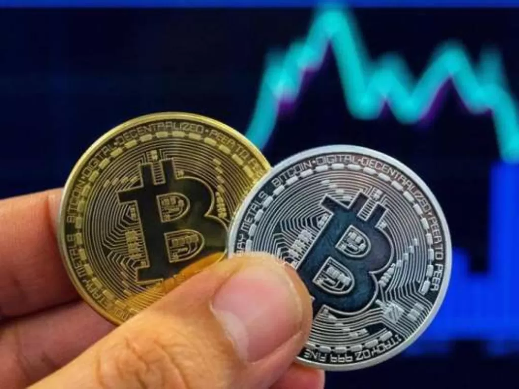 Ilustrasi mata uang bitcoin (INDIA TV)