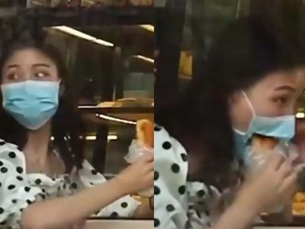 Aksi kocak seorang wanita makan tanpa lepas masker. (Screenshot)