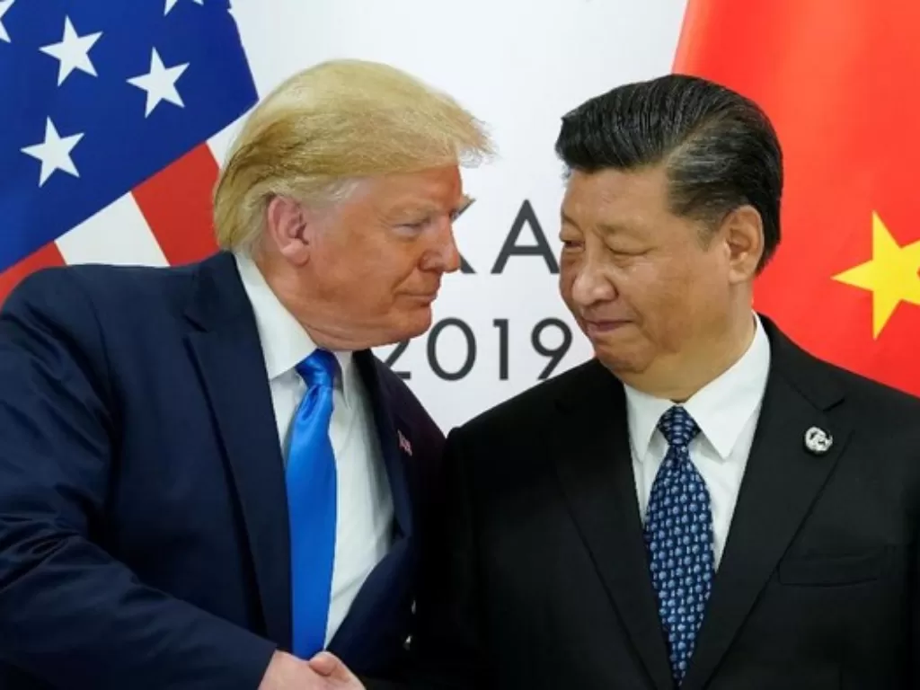 Presiden AS Donald Trump dan Presiden China Xi Jinping. (Reuters/Kevin Lamarque)