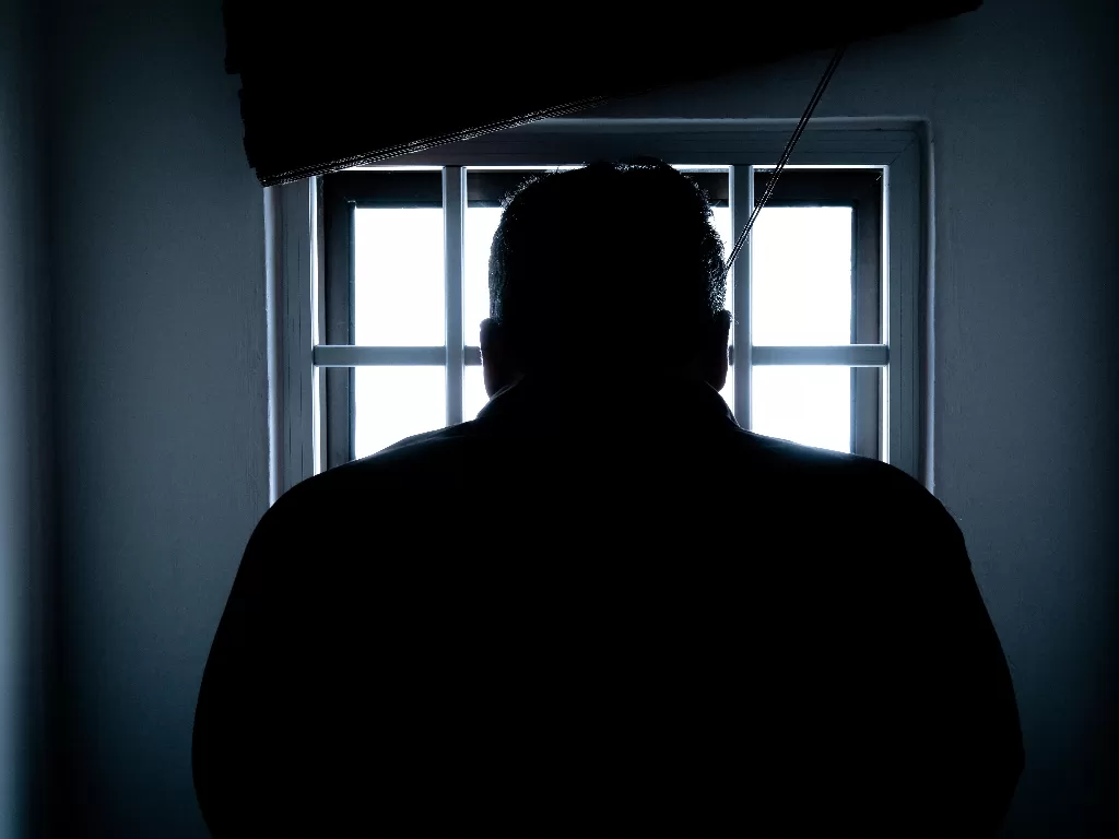 Ilustrasi seorang pria dipenjara. (photo/Ilustrasi/Pexels)