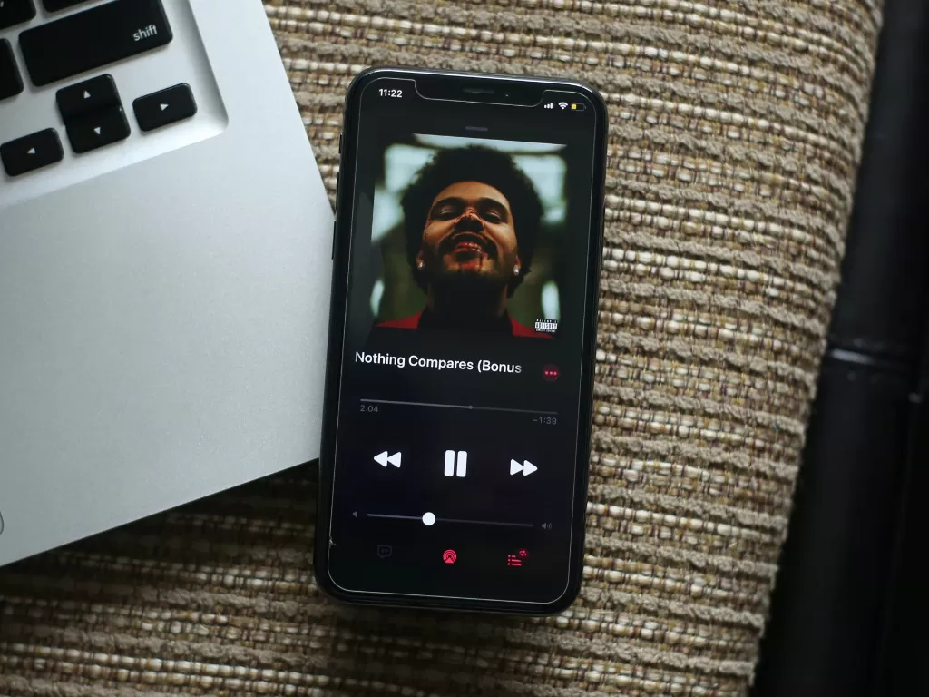 Aplikasi Apple Music di iPhone (photo/Unsplash/Giorgio Trovato)