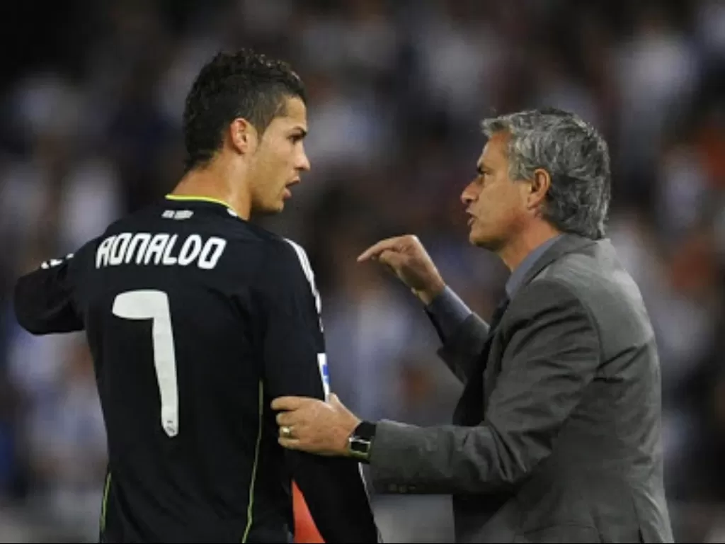 Jose Mourinho dan Cristiano Ronaldo ketika masih di Real Madrid. (REUTERS/Felix Ausin Ordonez)