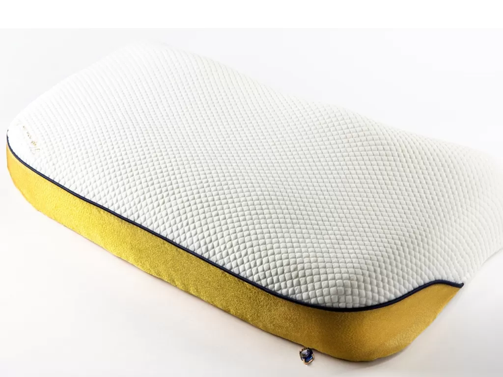 Tailormade Pillow Gold Edition. (architecturaldigest.com)
