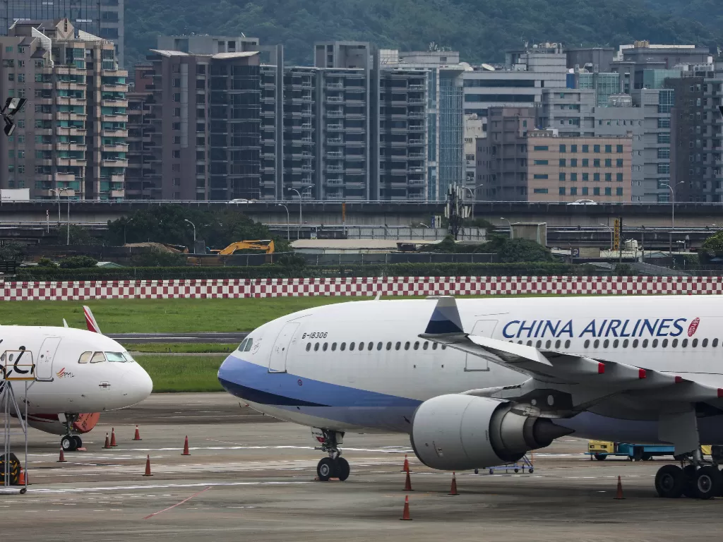Ilustrasi penerbangan di Tiongkok. (REUTERS/ Ann Wang)