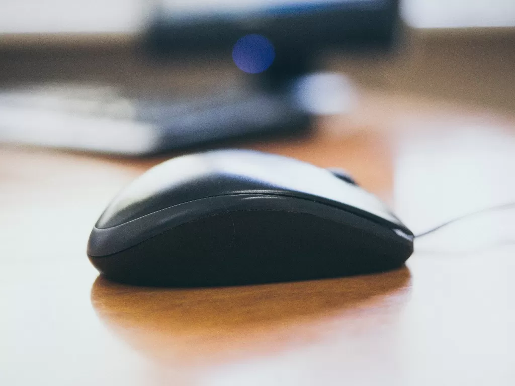 Ilustrasi Mouse untuk komputer (photo/Unsplash/Roman Synkevych)