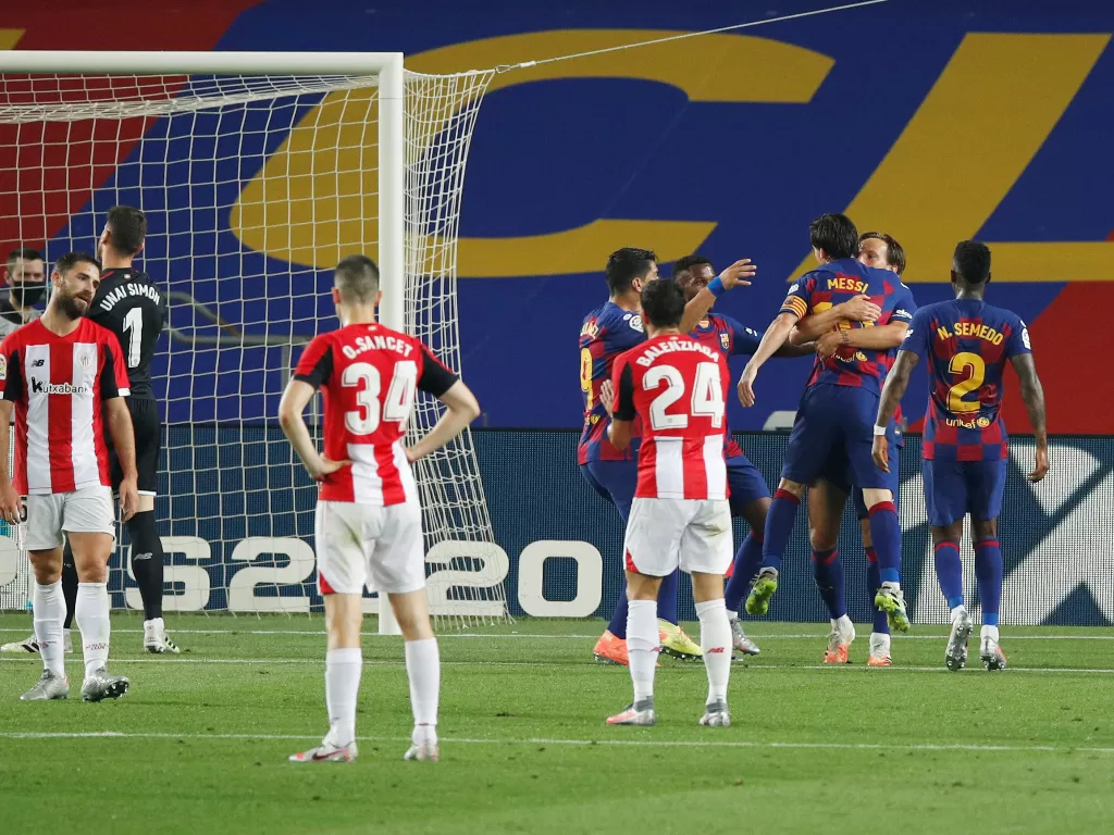 Skuad Barcelona melakukan selebrasi gol di laga kontra Athletic Bilbao. (REUTERS/Albert Gea)