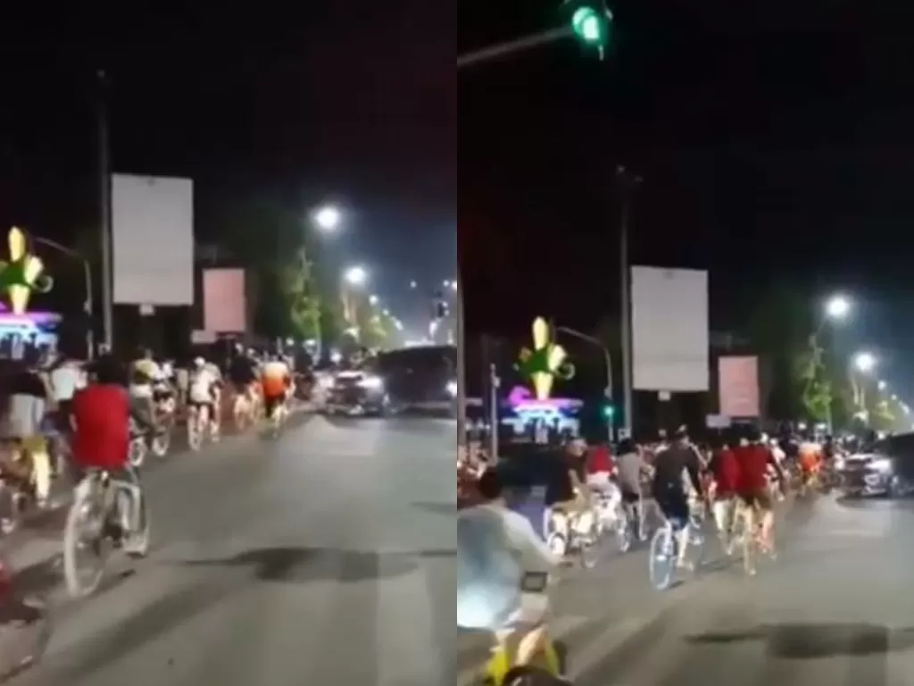 Pesepeda melanggar lampu lalu lintas. (Screenshot)