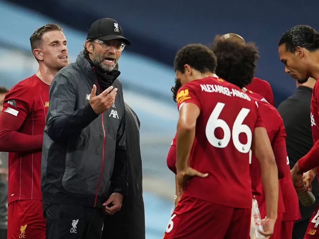 Jurgen Klopp dan para pemain Liverpool. (photo/REUTERS/DAVE THOMPSON)