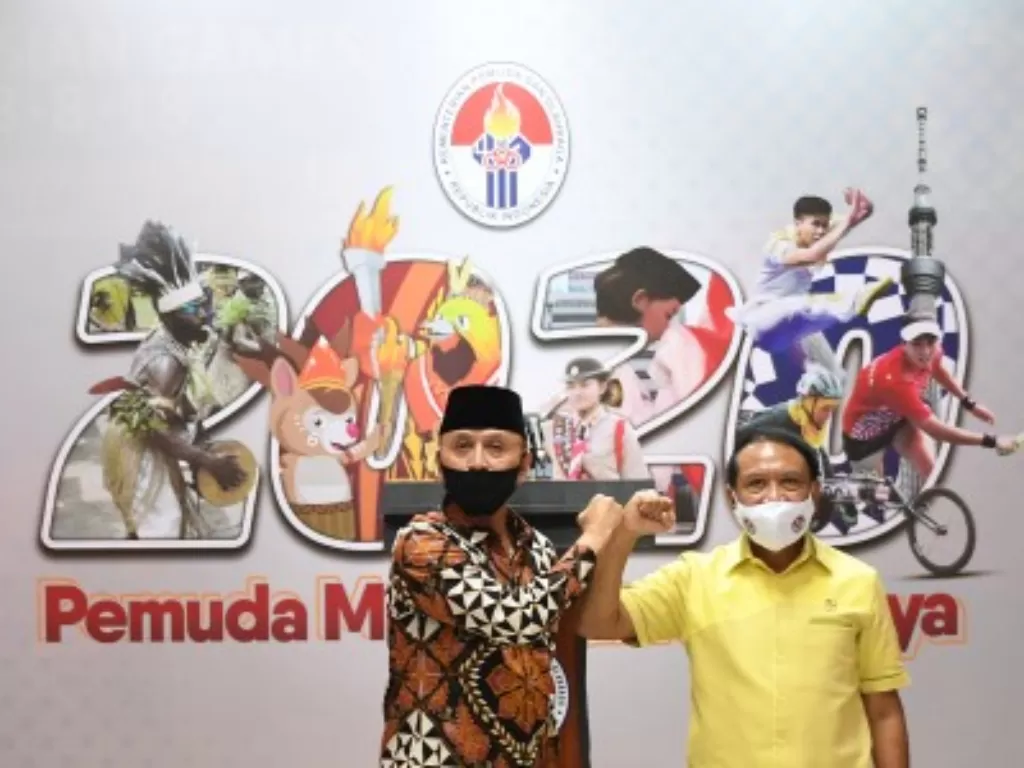 Menpora Zainudin Amali (kanan) dan Ketua Umum PSSI Mochamad Iriawan (kiri). (photo/NTARA FOTO/Humas Kemenpora-Satria Loka)