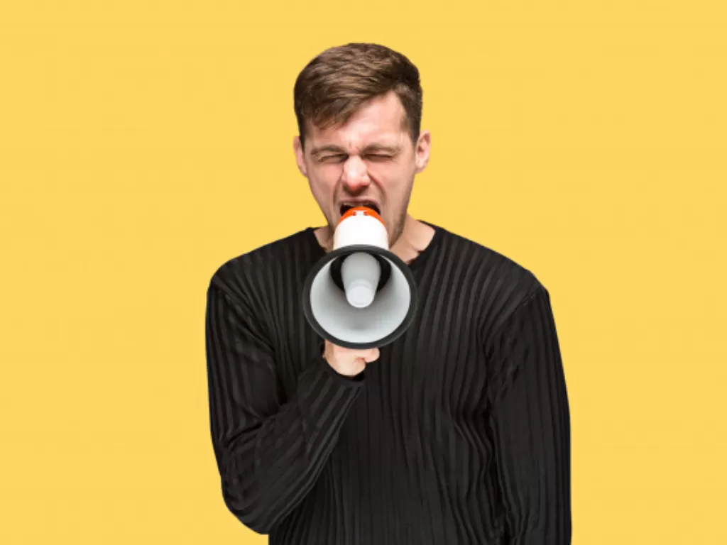 Ilustrasi pria berbicara menggunakan megaphone. (Freepik)