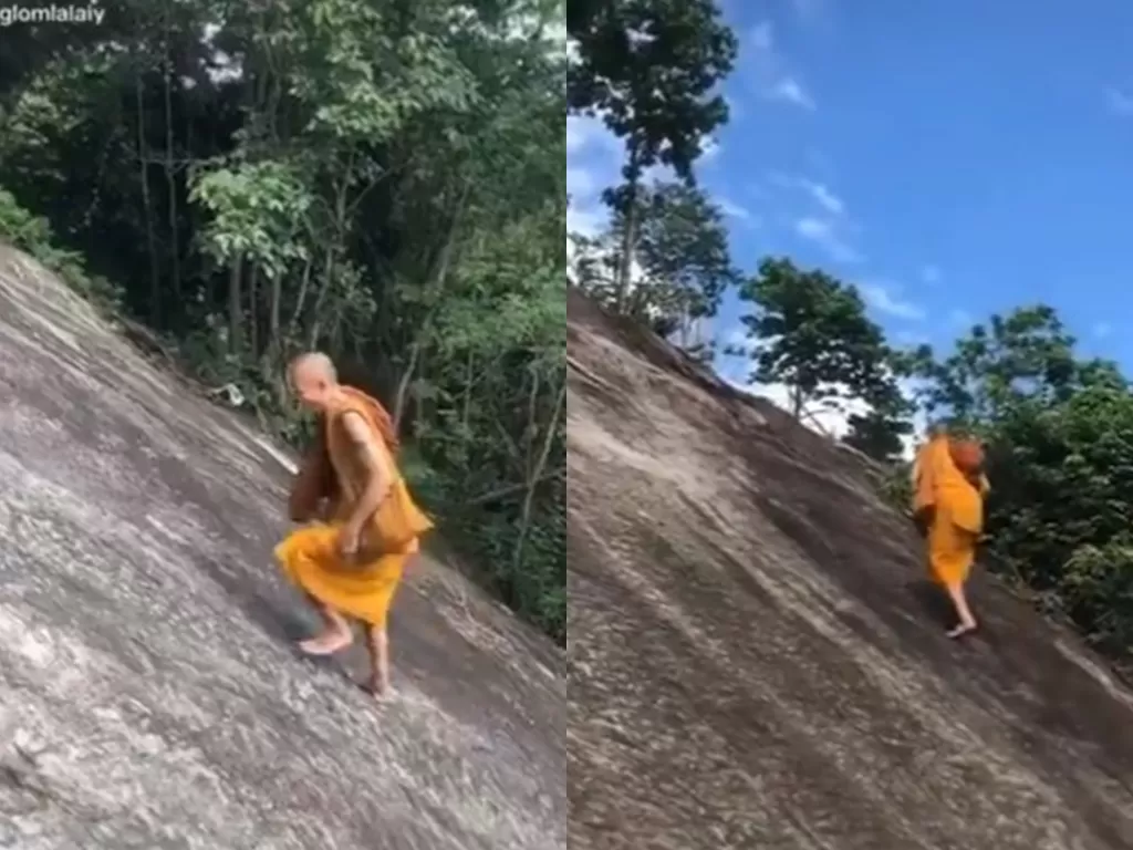 Biksu berjalan santai di tebing. (Screenshot)