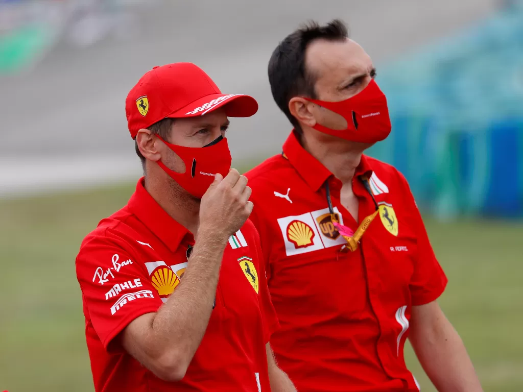 Pembalap senior Ferrari, Sebastian Vettel. (REUTERS/LEONHARD FOEGER)