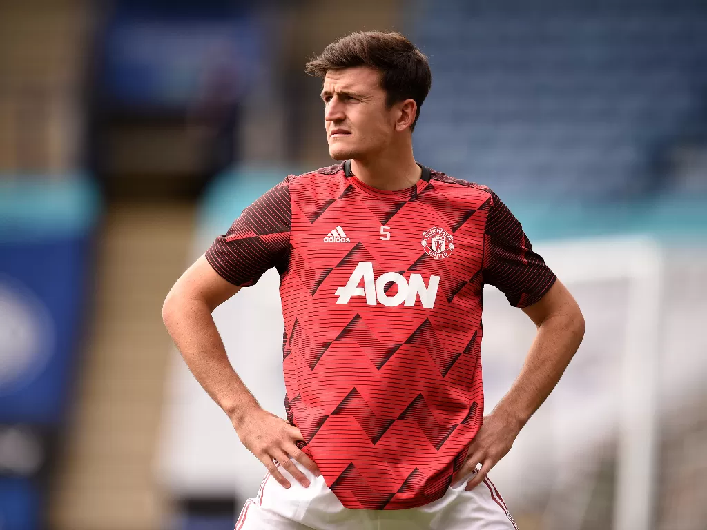 Bek Manchester United, Harry Maguire. (REUTERS/Oli Scarff)