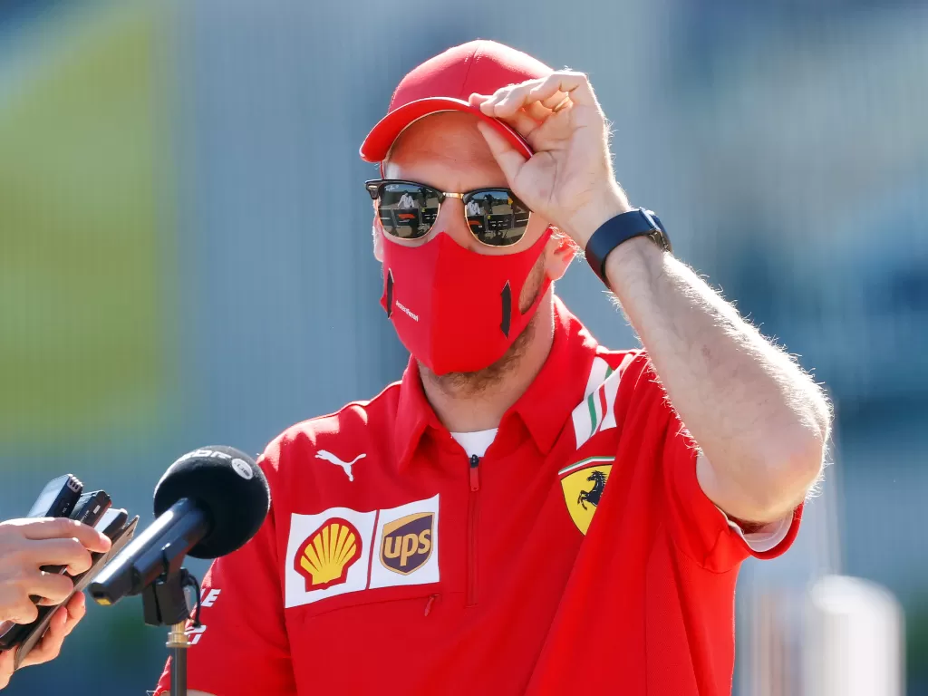 Pembalap senior Ferrari, Sebastian Vettel. (REUTERS/ANDREW BOYERS)