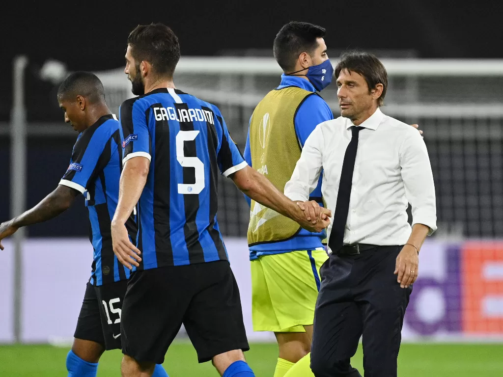 Antonio Conte dan punggawa Inter Milan di laga lawan Getafe. (REUTERS/INA FASSBENDER)