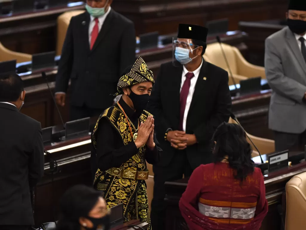 Presiden Joko Widodo tiba di lokasi sidang tahunan MPR dan Sidang Bersama DPR-DPD di Komplek Parlemen, Senayan, Jakarta, Jumat (14/8/2020). (ANTARA/Akbar Nugroho Gumay)