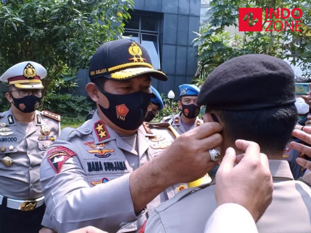 Pengecekan pendisiplinan penggunaan masker di tubuh Polda Metro Jaya dipimpin Kapolda Metro Irjen Pol Nana Sudjana di Polda Metro Jaya, Jakarta. (INDOZONE/Samsudhuha Wildansyah)