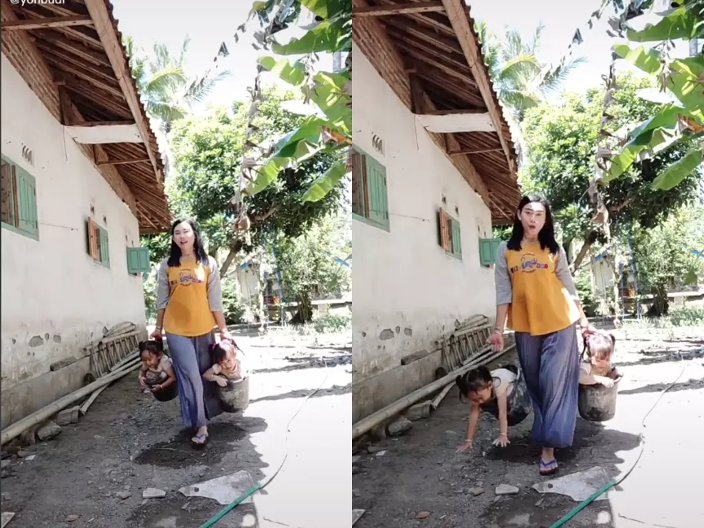 Potongan video ibu-ibu yang main tiktok, anaknya malah terjatuh dari ember. (photo/TikTok/@yonbudi)