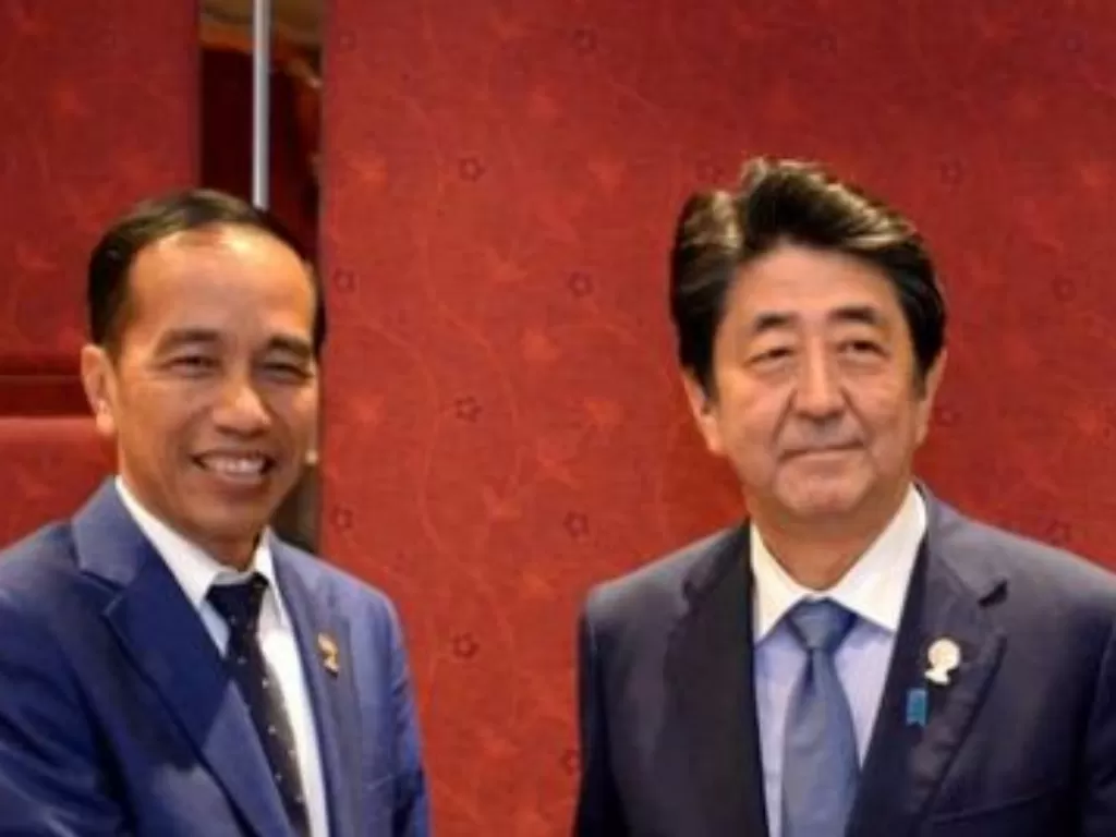 Presiden Joko Widodo dan mantan PM Jepang Shinzo Abe. (Twitter @jokowi)