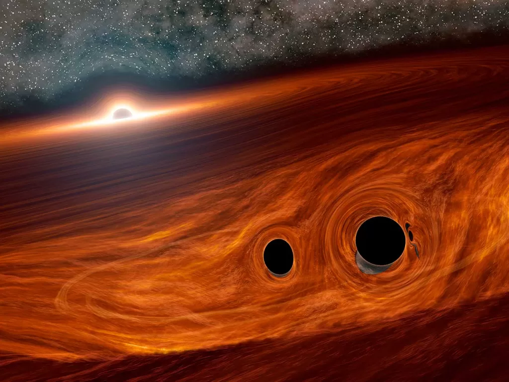 Lubang hitam akibat tabrakan di luar angkasa. (CALTECH/R. HURT (IPAC) VIA NASA)