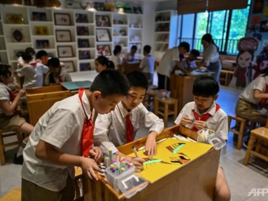 Sekolah di Wuhan, China, kembali buka. (AFP via Channel News Asia)