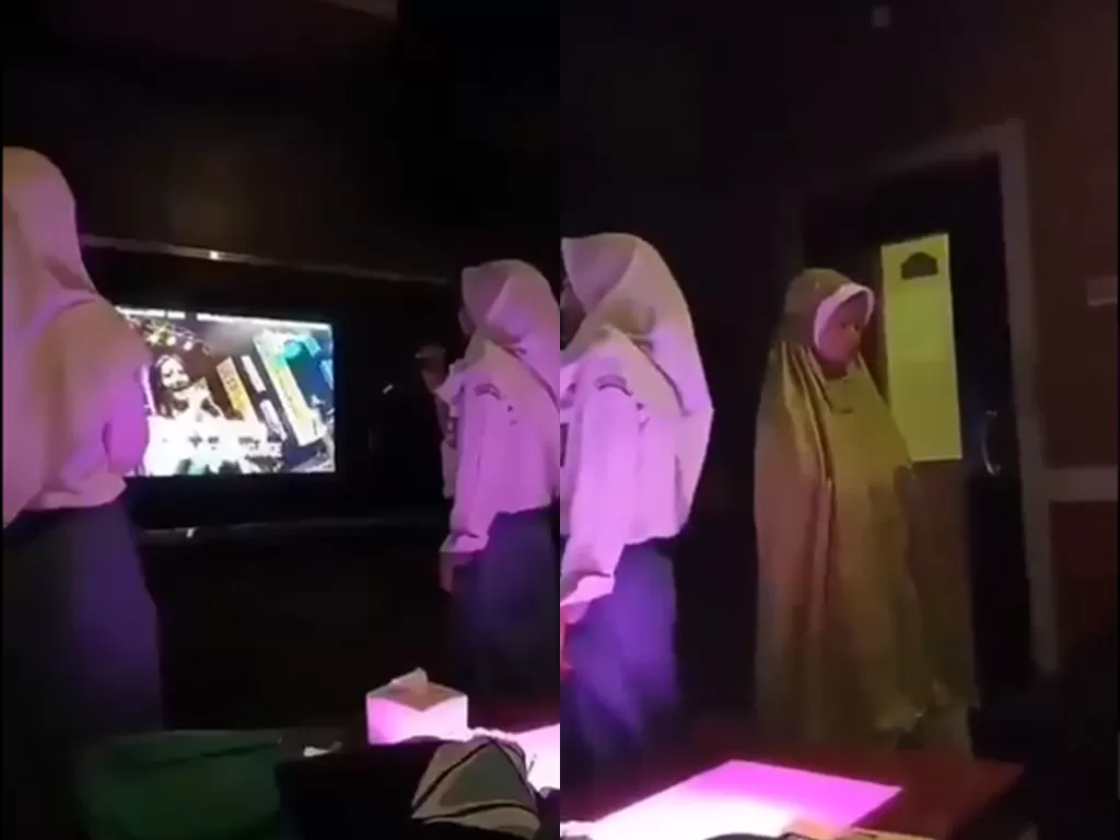 Cuplikan video gadis yang tetap shalat meski temannya tengah bernyanyi di karaoke. (photo/Twitter/@NoContextID)