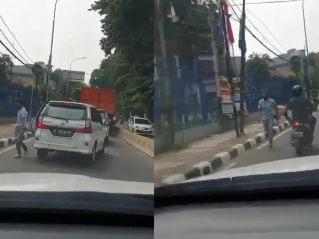 Hasil tangkapan layar pelaku melempari mobil dengan batu di Tugu Proklamasi, Jakarta Pusat, Selasa (8/9/2020). (Instagram/westjurnalpalma)