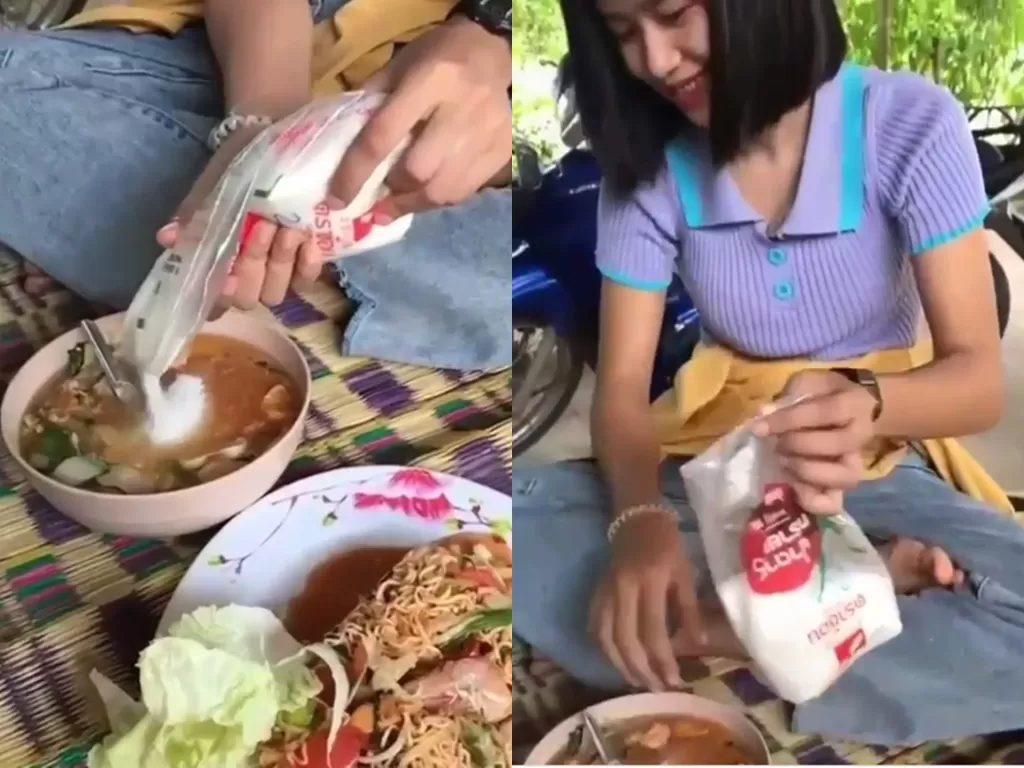Potongan video wanita yang tuangkan micin ke makanannya. (photo/Instagram/agoez_bandz4)
