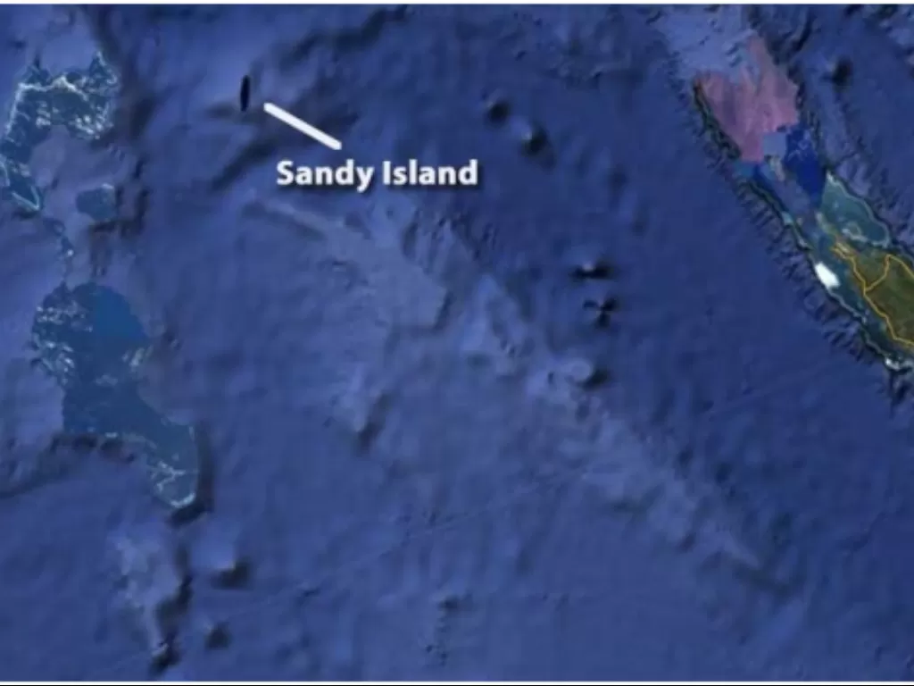 Wilayah yang diyakini sebagai Pulau Sandy di Samudra Pasifik Selatan. (embedgooglemaps.com)