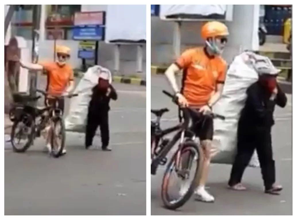 Pria tampan bersepeda bantu pemulung menyeberangi jalan. (Instagram/@viralno.1)