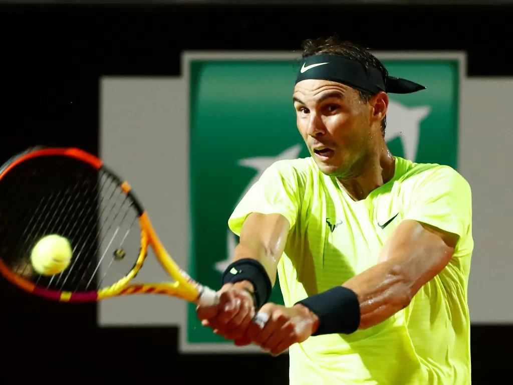Rafael Nadal dari Spanyol beraksi (REUTERS/Angelo Carconi)