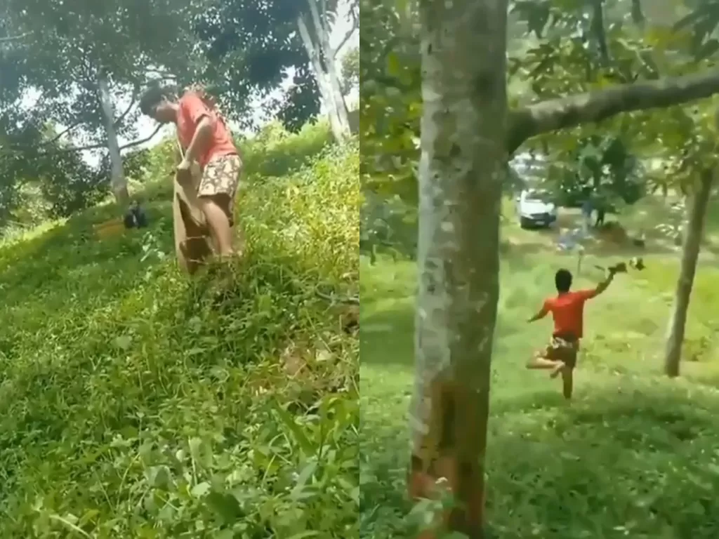 Cuplikan video saat pria yang terperosok ke bawah saat tangkap buah durian. (photo/Instagram/@ balichannel)