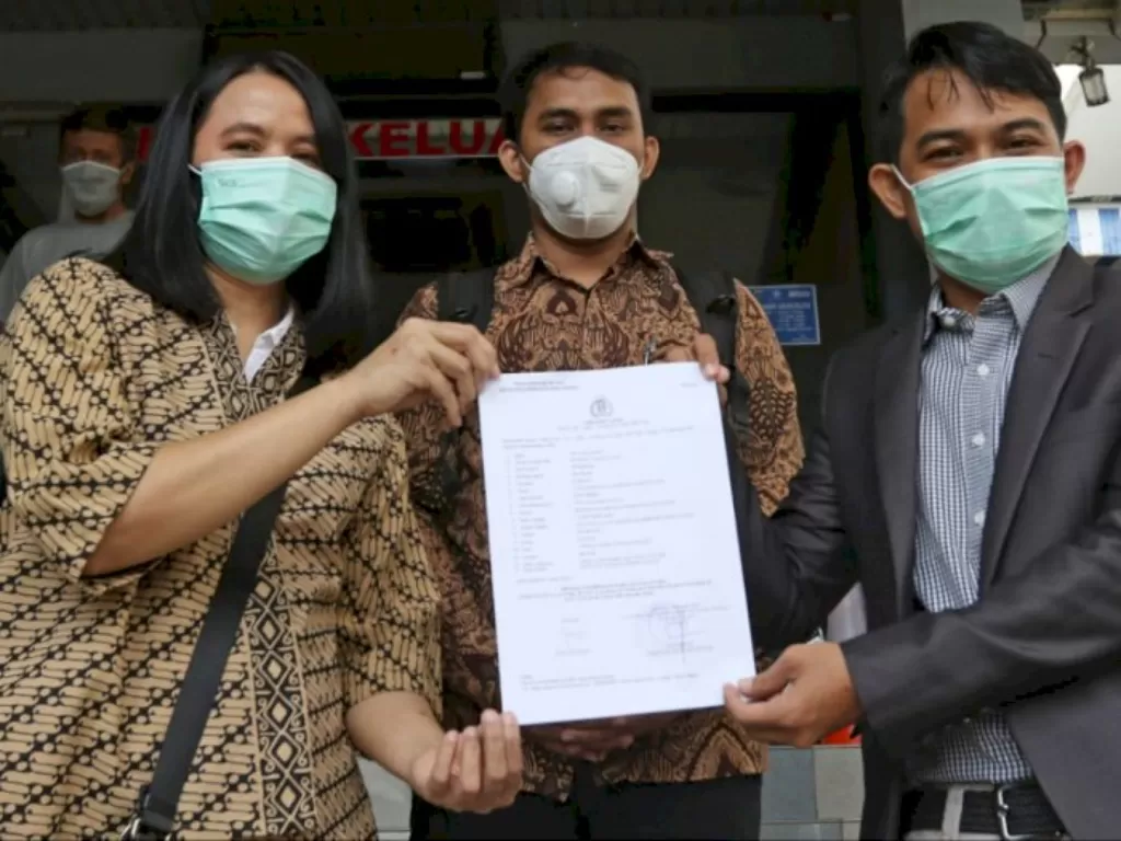 Pihak Liputan6.com saat melaporkan kasus doxing di Polda Metro Jaya, Senin (21/9/2020). (Istimewa)