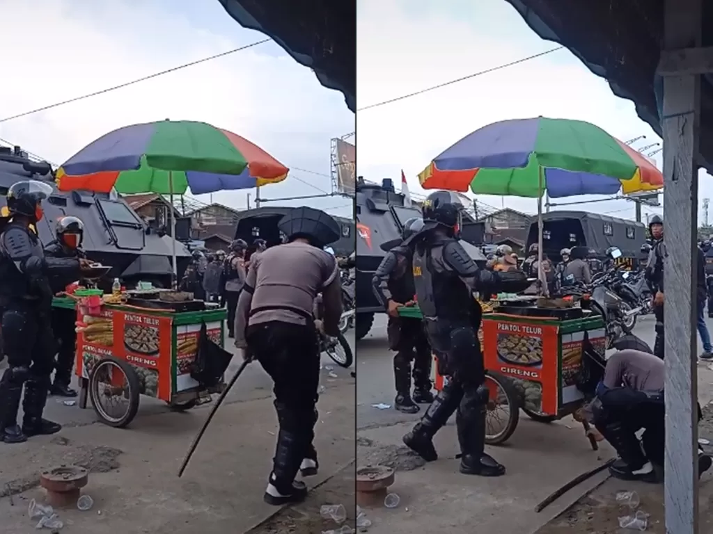 Cuplikan video saat polisi pindahkan gerobak pentol ke tempat yang aman. (photo/TikTok/@octaviamelindaa)