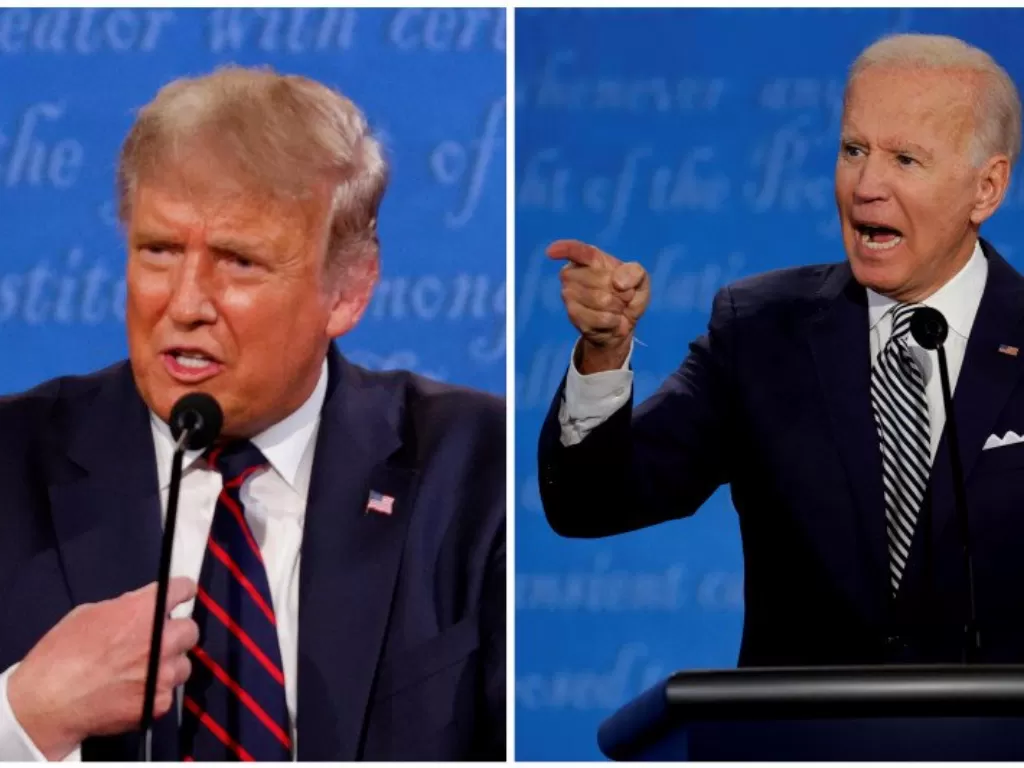 Calon presiden AS, Donald Trump dan Joe Biden pada debat pertama dalam kampanye presiden 2020. (REUTERS/Brian Snyder/TM) . 