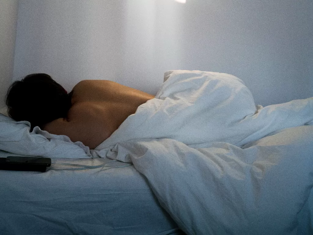 Ilustrasi tidur tanpa bra (Pexels/Nick Bondarev)