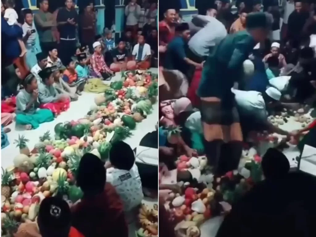 Cuplikan video saat warga yang berebutan makanan saat perayaan maulid nabi. (photo/Instagram/@makassar_iinfo)