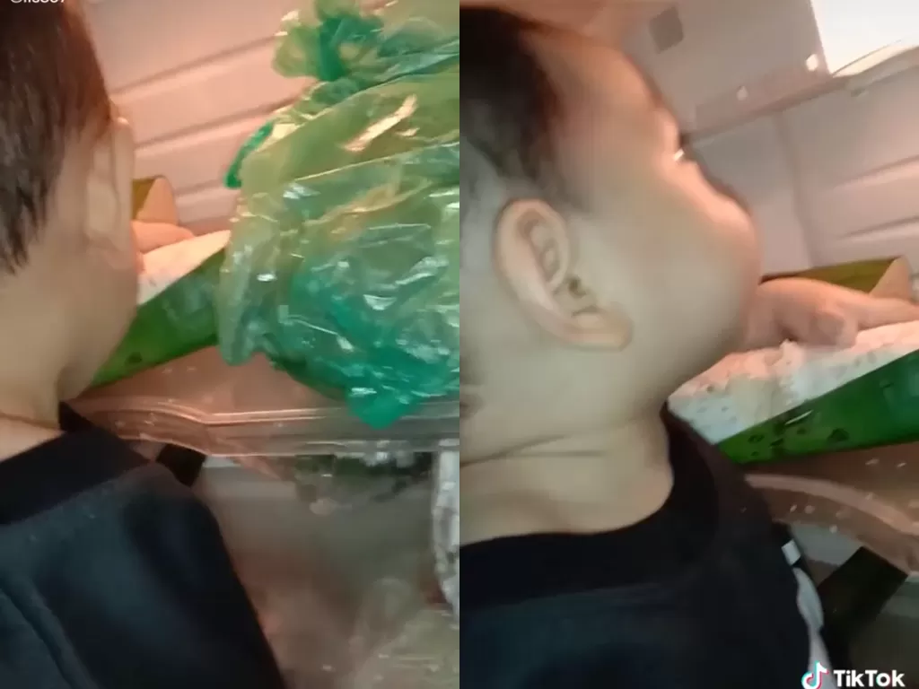 Cuplikan video disaat bocah yang makan tempe di depan kulkas. (photo/TikTok/@iis837)