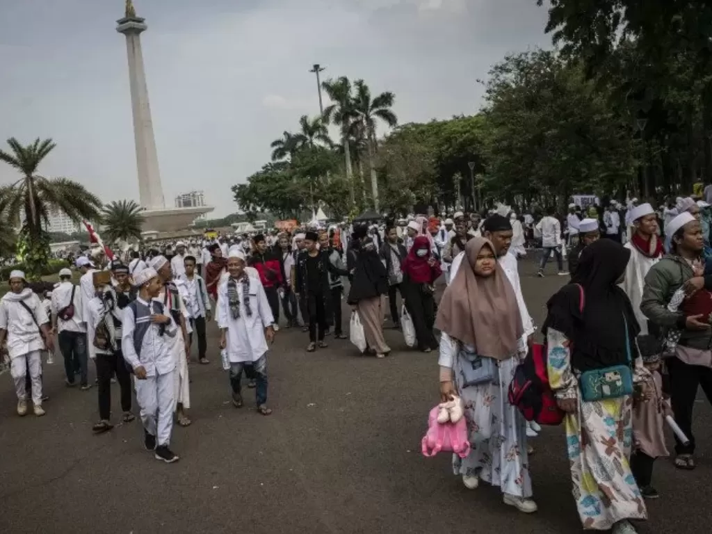   Peserta mengikuti aksi reuni 212 di kawasan Monas, Jakarta, Senin (2/12/2019). (Photo/ANTARA FOTO/Aprillio Akbar)