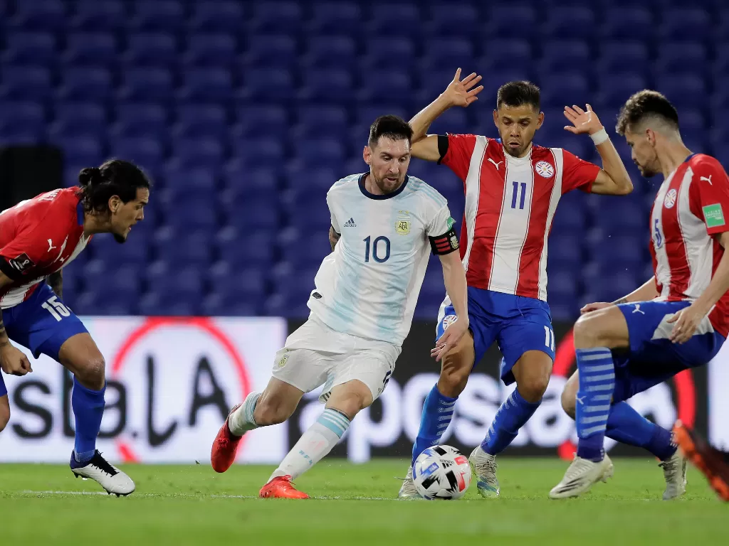 Lionel Messi dalam laga Argentina vs Paraguay kualifikasi Piala Dunia 2022, Jumat (13/11/2020) pagi WIB. (REUTERS/POOL)
