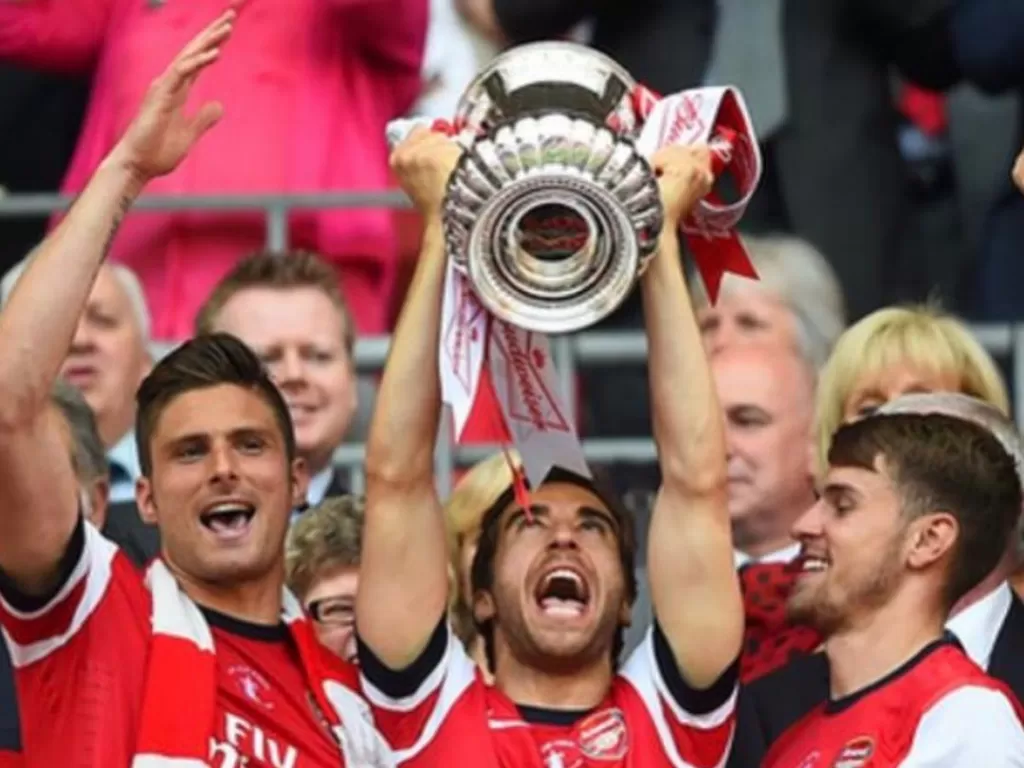 Arsenal saat meraih gelar juara Piala FA tahun 2014 dimana Mathieu Flamini (tengah) masih bermain untuk The Gunners. (Instagram/@mathieufalmini)