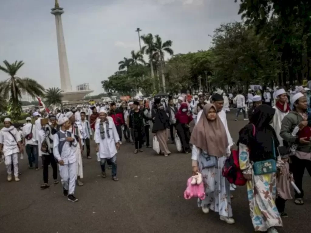 Peserta mengikuti aksi reuni 212 di kawasan Monas, Jakarta, Senin (2/12/2019). (ANTARA FOTO/Aprillio Akbar)