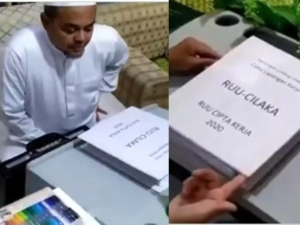 Pria diduga Rizieq Shihab sedang membaca naskah RUU Cilaka. (Twitter @Kabar_FPI)